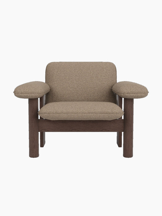Front view of the Brasilia Lounge Chair, Low Back. Features dark stained oak frame and plush Logan Flint textile upholstery.