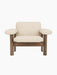 Front view of the Brasilia Lounge Chair with a low back, featuring a solid walnut frame and off-white Logan Jasmine textile.