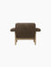 Back view of the Brasilia Lounge Chair, Low Back, upholstered in brown sheepskin, showing its natural oak wooden frame.