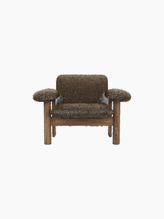 Front view of the Brasilia Lounge Chair, Low Back, with a dark wood frame and plush, dark brown sheepskin upholstery.