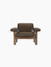 Front view of the Brasilia Lounge Chair, Low Back, with a dark wood frame and plush, dark brown sheepskin upholstery.