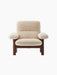 A front view of the Brasilia Lounge Chair with a high back, dark stained oak frame and thick, plush sheepskin upholstery.