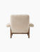 Back view of the Brasilia Lounge Chair, High Back, featuring cream sheepskin upholstery on a dark walnut frame.