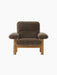 Front view of the Brasilia Lounge Chair. Natural oak frame with plush, high-backed upholstery in dark brown sheepskin.