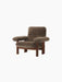 An angled view of the Brasilia Lounge Chair with a high back, featuring a dark walnut frame and plush, brown Root sheepskin.