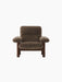 Front view of the Brasilia Lounge Chair with a high back, walnut frame and plush, dark brown Sheepskin Root upholstery.