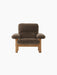 Front view of the high-back Brasilia Lounge Chair with a natural oak frame and upholstered in dark brown Root sheepskin.
