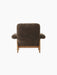 Back view of the Brasilia Lounge Chair, High Back, upholstered in dark brown Sheepskin Root with a natural oak frame.