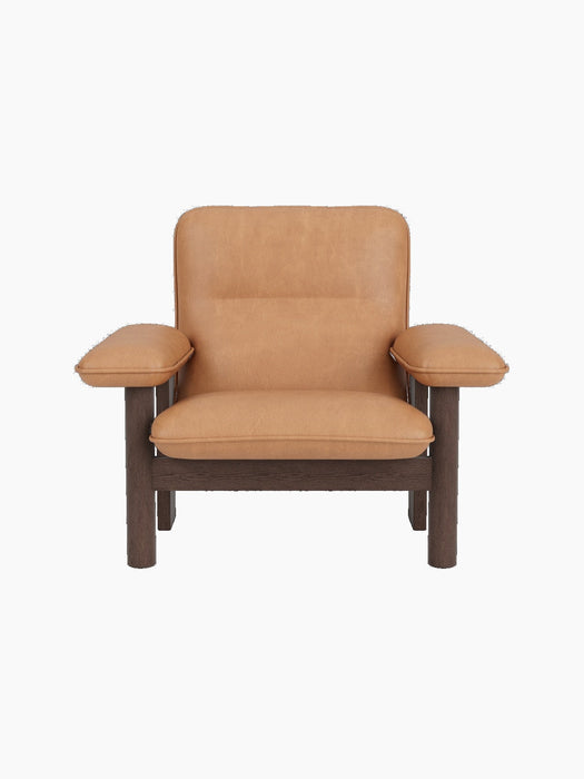 Front-on view of the Brasilia Lounge Chair, High Back, with a dark stained oak frame and plush camel-coloured upholstery.