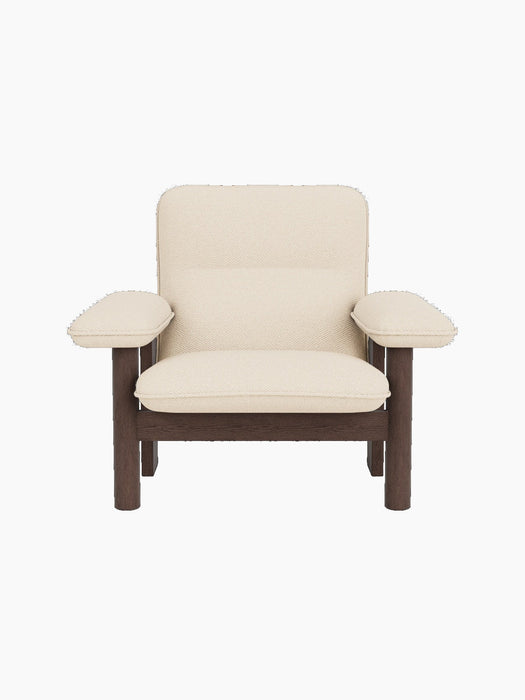 Front view of the Brasilia Lounge Chair, High Back, with a dark stained oak frame and cream-coloured Logan Jasmine fabric.