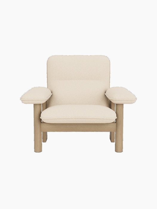 Front view of the Brasilia Lounge Chair with a high back, natural oak frame, and off-white Logan Jasmine textile upholstery.