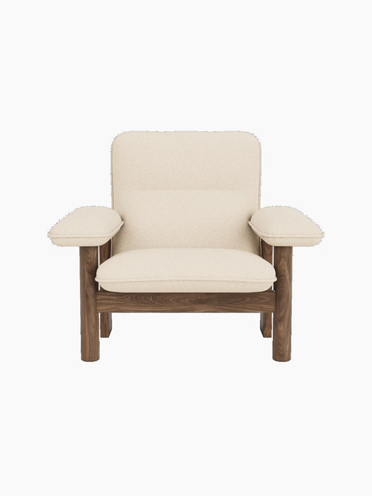 Front view of the Brasilia Lounge Chair with a solid walnut frame and cream Logan Jasmine fabric upholstery.