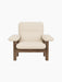 Front view of the Brasilia Lounge Chair with a solid walnut frame and cream Logan Jasmine fabric upholstery.