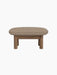 Side profile of the Brasilia Ottoman with a walnut frame and cushioned seat upholstered in textured Logan Flint fabric.