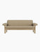 A front-on view of the two-seater Brasilia Sofa, featuring a natural oak frame and upholstered in light beige Audo Bouclé 02.