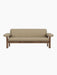 A front-on studio shot of the Brasilia Sofa, featuring a walnut wood frame and beige Audo Bouclé 02 upholstery.
