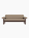 Front view of the Brasilia Sofa with a Dark Stained Oak frame and light brown Logan Flint upholstery on a black background.