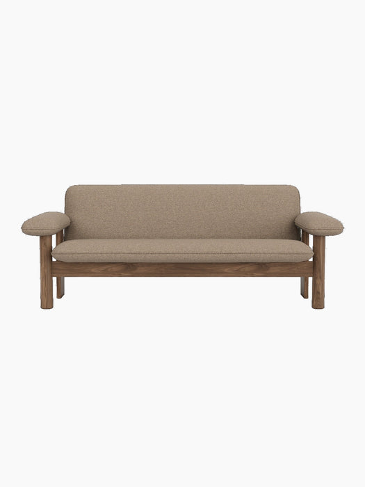 Front view of the Brasilia Sofa, featuring a solid walnut wood frame and light brown Logan Flint textile upholstery.