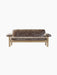 Front view of the Brasilia Sofa, upholstered in plush brown sheepskin, featuring a natural oak frame and rounded armrests.