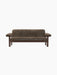 Front view of the Brasilia Sofa, Sheepskin. The two-seat sofa features a dark stained wooden frame and dark brown sheepskin.