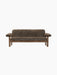 A front view of the Brasilia Sofa in dark brown sheepskin. The sofa features a wooden frame with rounded legs and arms.