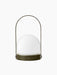 A front view of the Carrie Table Lamp, Portable. It has an olive base, a white frosted glass orb, and a thin, arched handle.