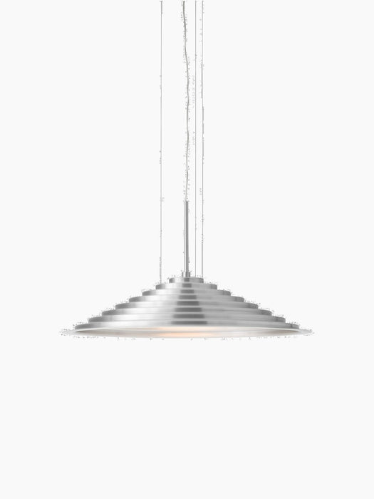 A front-on view of the brushed aluminium Chancery Pendant Lamp, showing its wide, stepped silhouette and soft, glowing light.