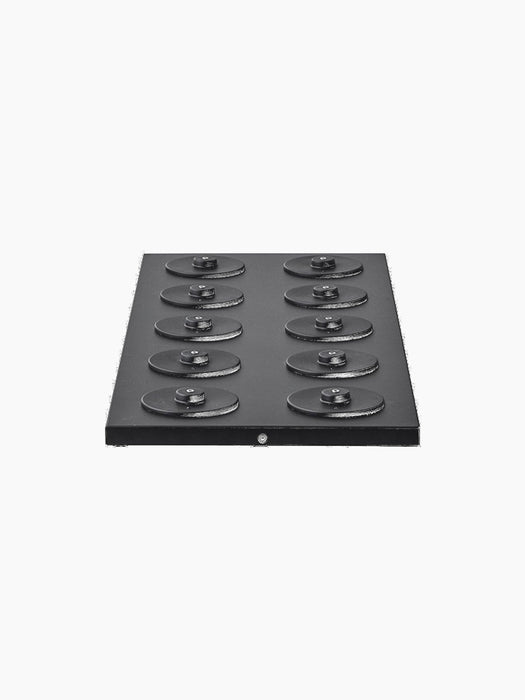 A black, rectangular charging board with twelve circular charging points, shown from the side against a black background.