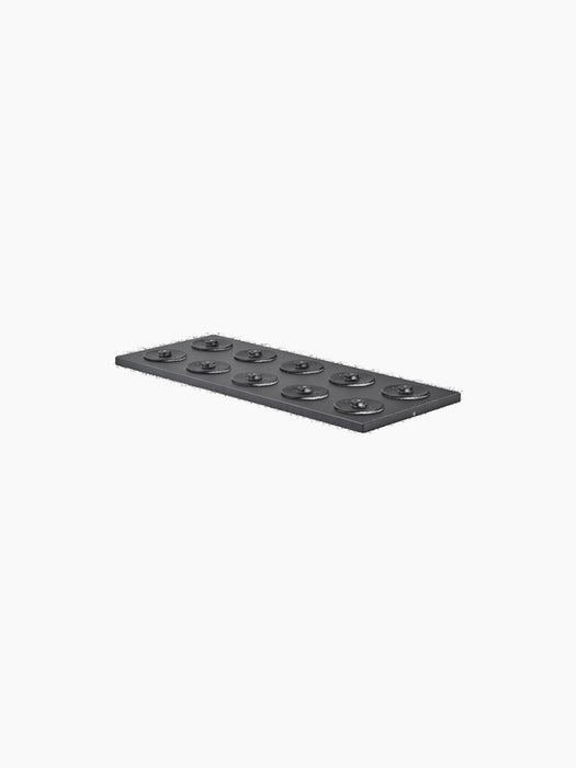A sleek, rectangular black charging board with ten circular charging docks, pictured at an angle on a plain black background.