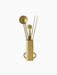 A brass Clip Candle Care Kit against a black background. The kit includes a snuffer, wick trimmer, and dippers in a holder.