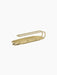 Angled view of the brass Clip Candle Holder Table 3-arm, a minimalist design with a curved handle and an oval base.