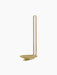 Angled view of the Clip Candle Holder H20 Wall in brass, with its looped handle and saucer base against a black background.