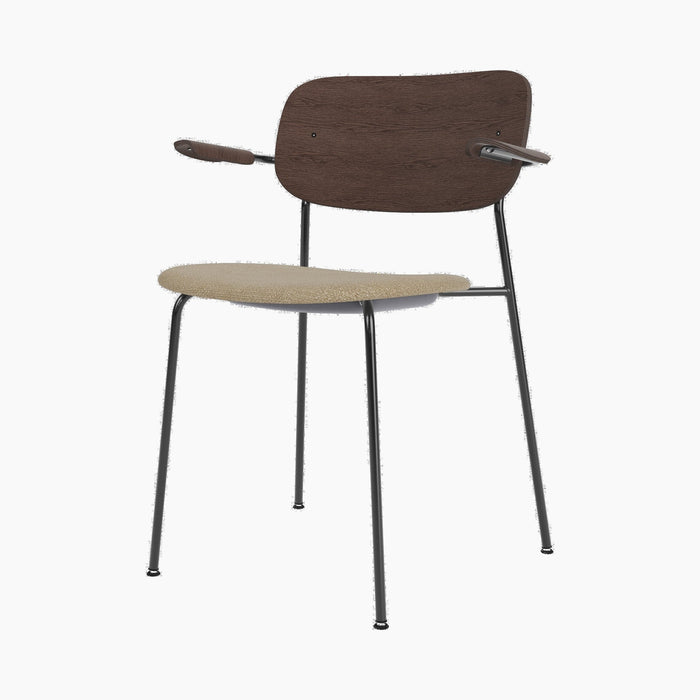 Co Dining Chair, upholstered seat with armrest, Black Frame - Dark Stained Oak | Audo Bouclé 02