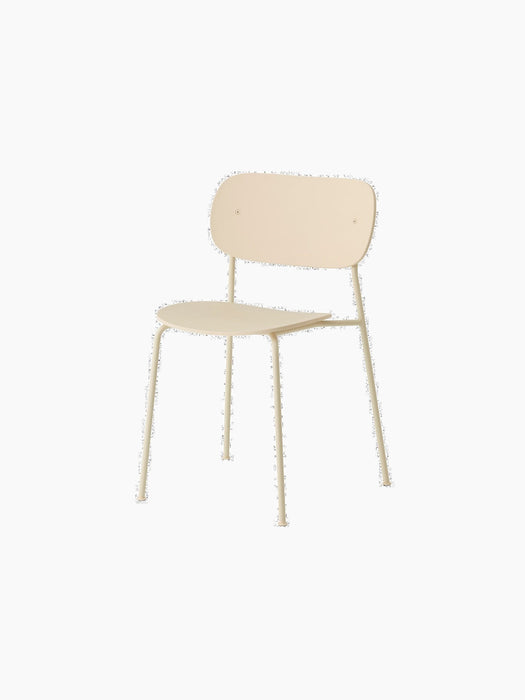An ivory-coloured Co Dining Chair, Outdoor, without armrests, shown from an angle against a plain black background.