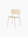 An ivory-coloured Co Dining Chair, Outdoor, without armrests, shown from an angle against a plain black background.