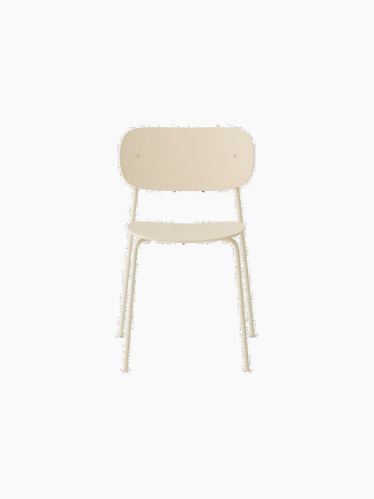 A front-facing view of the Co Dining Chair, Outdoor, in an ivory finish. The minimalist chair has no armrests.