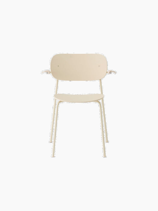 Front view of the Co Dining Chair, Outdoor in an ivory finish. A minimalist chair with a curved back, seat, and armrests.