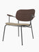 A Co Lounge Chair with a dark stained oak backrest, a beige bouclé upholstered seat, and a minimalist black steel frame.