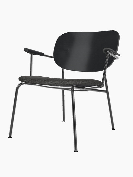 Co Lounge Chair with a slender black steel frame, dark grey upholstered seat, and curved black painted oak backrest.