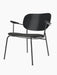 Co Lounge Chair with a slender black steel frame, dark grey upholstered seat, and curved black painted oak backrest.