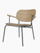 Co Lounge Chair with a stone leather upholstered seat, natural oak wood backrest and armrests, on a slender black steel frame