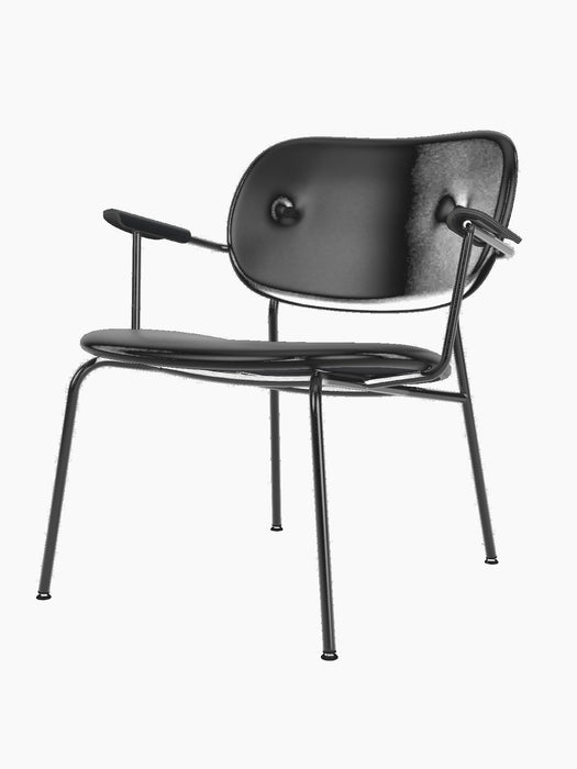 A front-three-quarters view of the Co Lounge Chair, fully upholstered in black leather with black painted oak armrests.