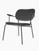 Side view of the Co Lounge Chair, fully upholstered in dark grey Re-wool with black painted oak armrests and a black frame.