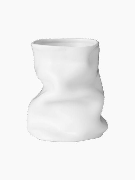 Front view of the white Collapse Vase 20, a sculptural ceramic vase with an organic, crumpled shape, on a black background.