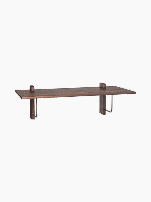 Angled view of the Corbel Desk in dark stained oak. The wall-mounted desk has two wooden support brackets and metal hooks.