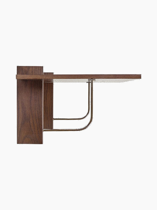 A left side view of the wall-mounted Corbel Desk in dark stained oak, showing its distinctive curved metal support bracket.