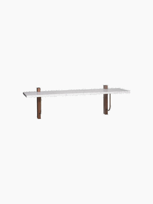 Angled view of the Corbel Shelf, featuring a white Carrara marble top supported by two dark wood brackets with brass hooks.