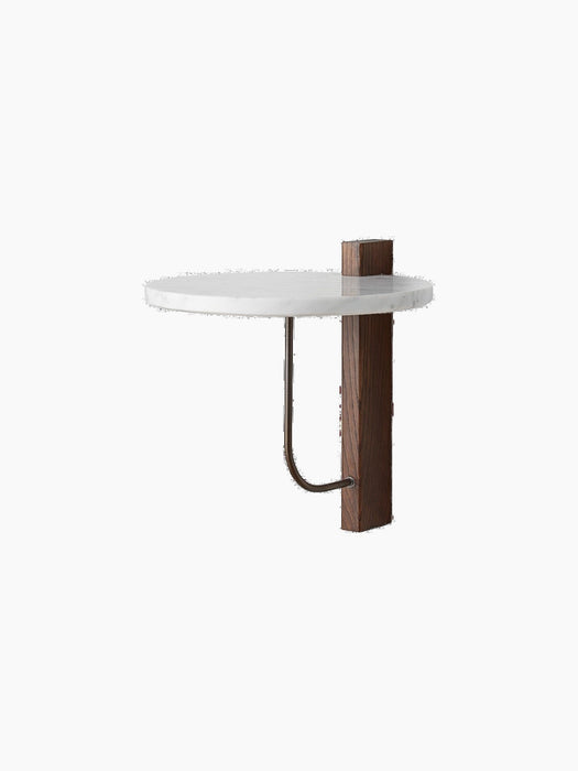 Corbel Shelf with a white Carrara marble top, dark wood wall mount, and bronzed brass bracket, viewed at an angle.