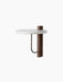 Corbel Shelf with a white Carrara marble top, dark wood wall mount, and bronzed brass bracket, viewed at an angle.