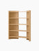 Angled view of a minimalist, light oak bookshelf with five shelves and a partial open-back design against a black background.